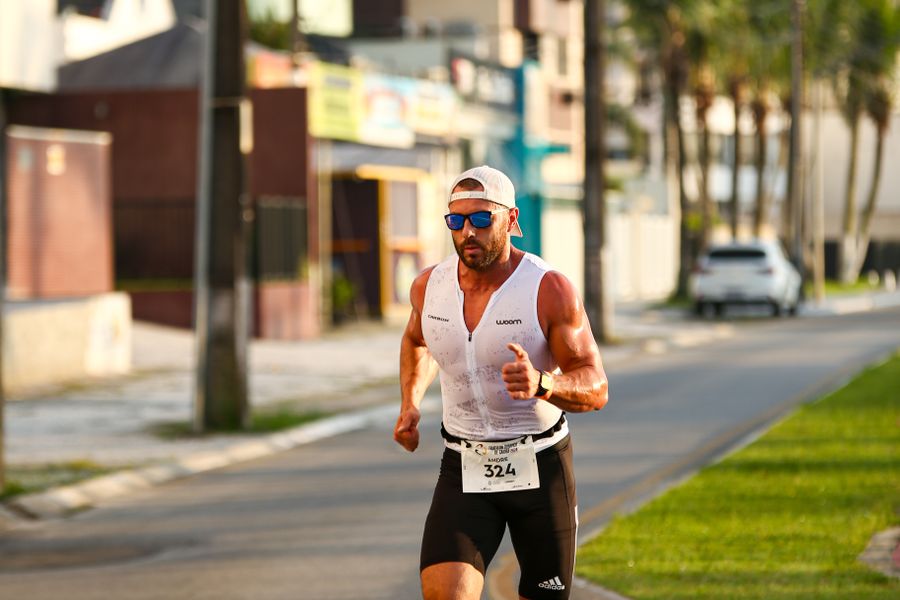 A runner racing on a closed city street